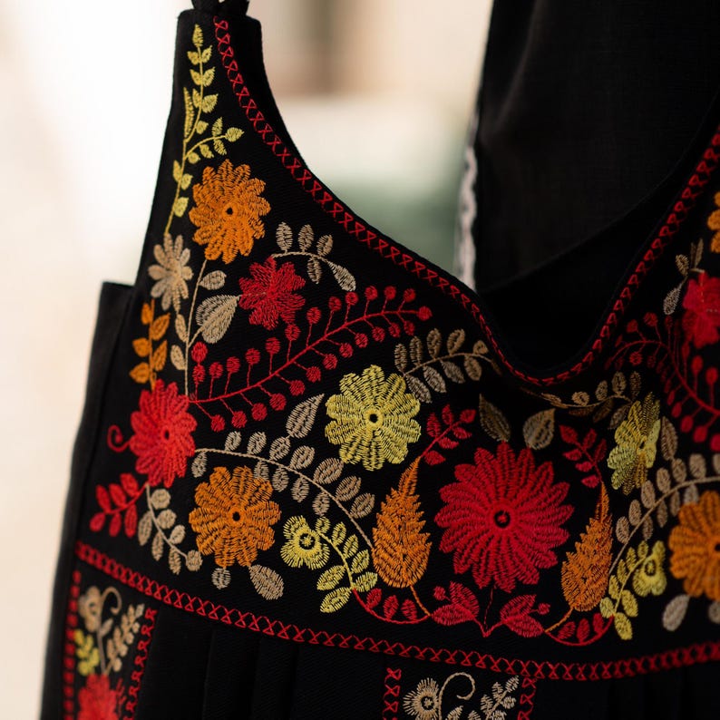 Boho embroidered shoulder bag — Black fabric tote with floral patterns — Ethnic cross-body bag with metal rings for women